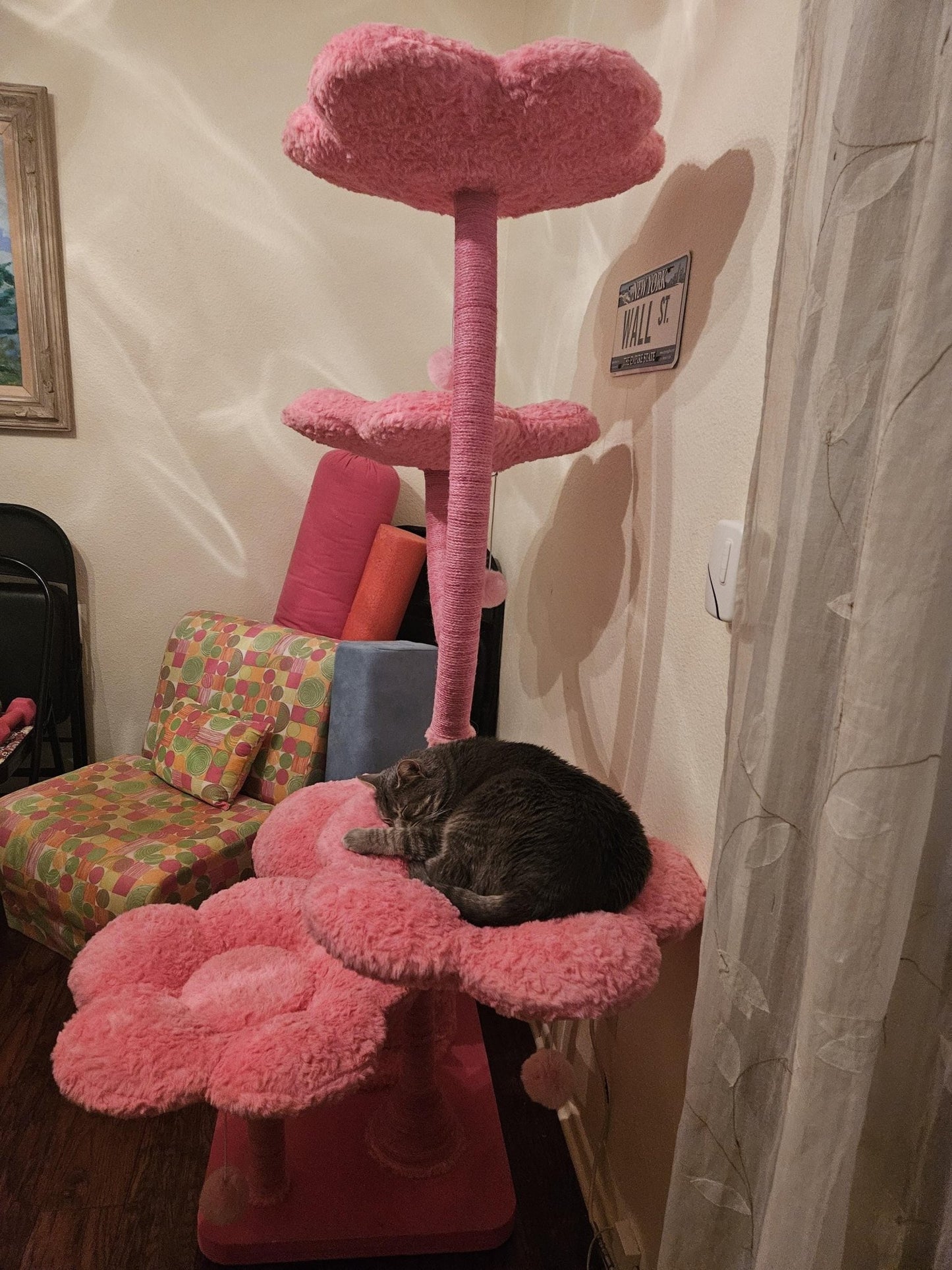 Flower cat tree with multiple levels and hiding spots.